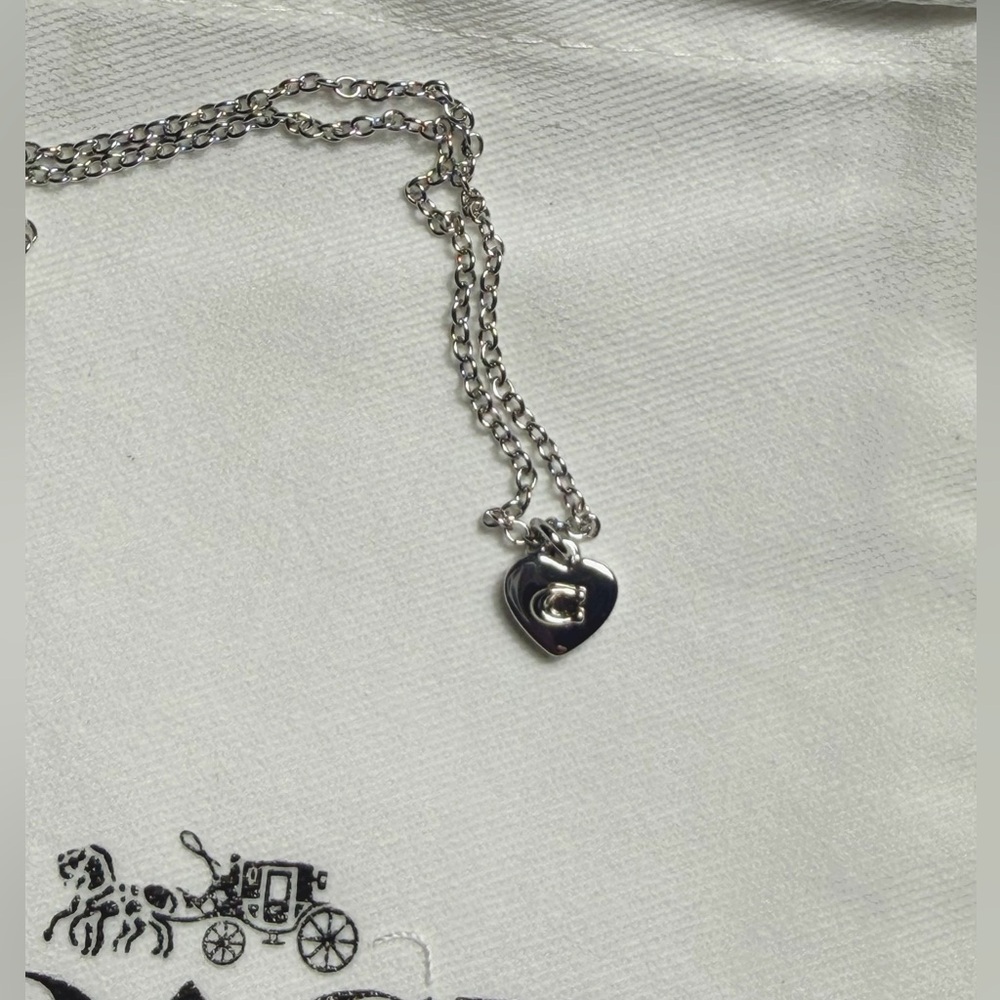Coach Silver Necklace With Heart Shaped Pendant And Dust Bag NWT